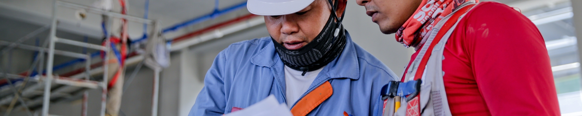 two man holding white paper 1216589