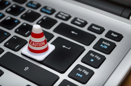 white caution cone on keyboard 211151